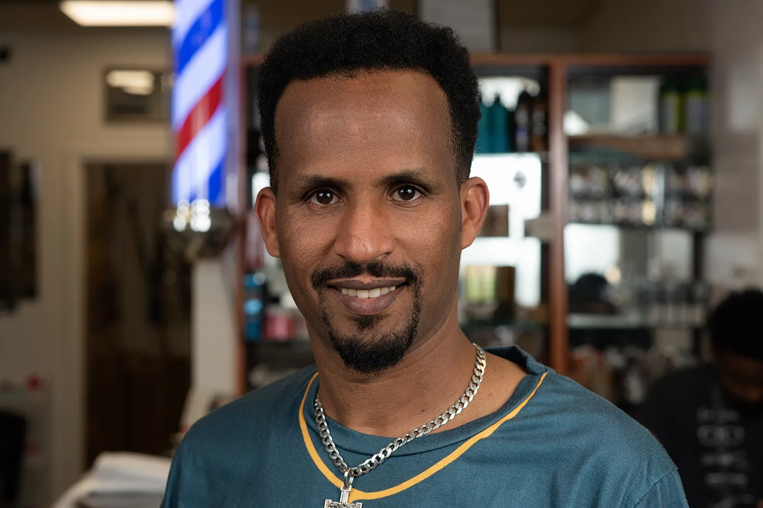 Yosief Teweldebrhan, Barber at Raza Barbershop</p>
<p>